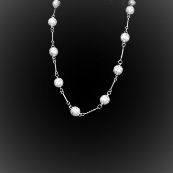 Collier Tibétain sur axe en broderie d'argent Collier Tibétain sur axe en broderie d'argent